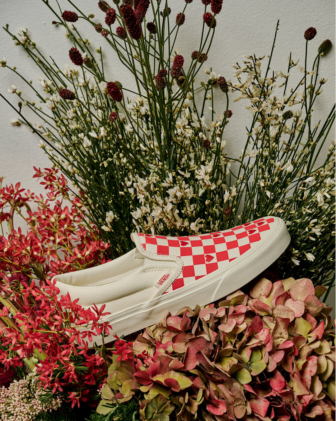 Women Vans Classic Slip-On Checkerboard Shoe in Checkerboard Racing Red