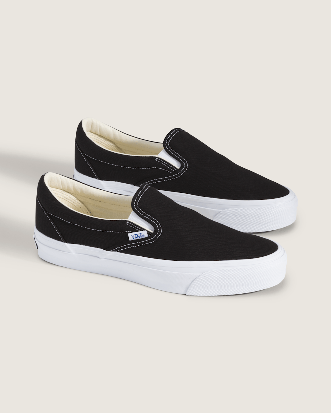 Women Vans Premium Slip-On Shoe in Black / White