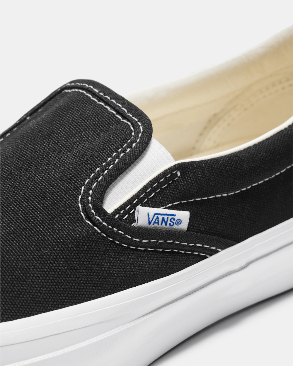 Women Vans Premium Slip-On Shoe in Black / White