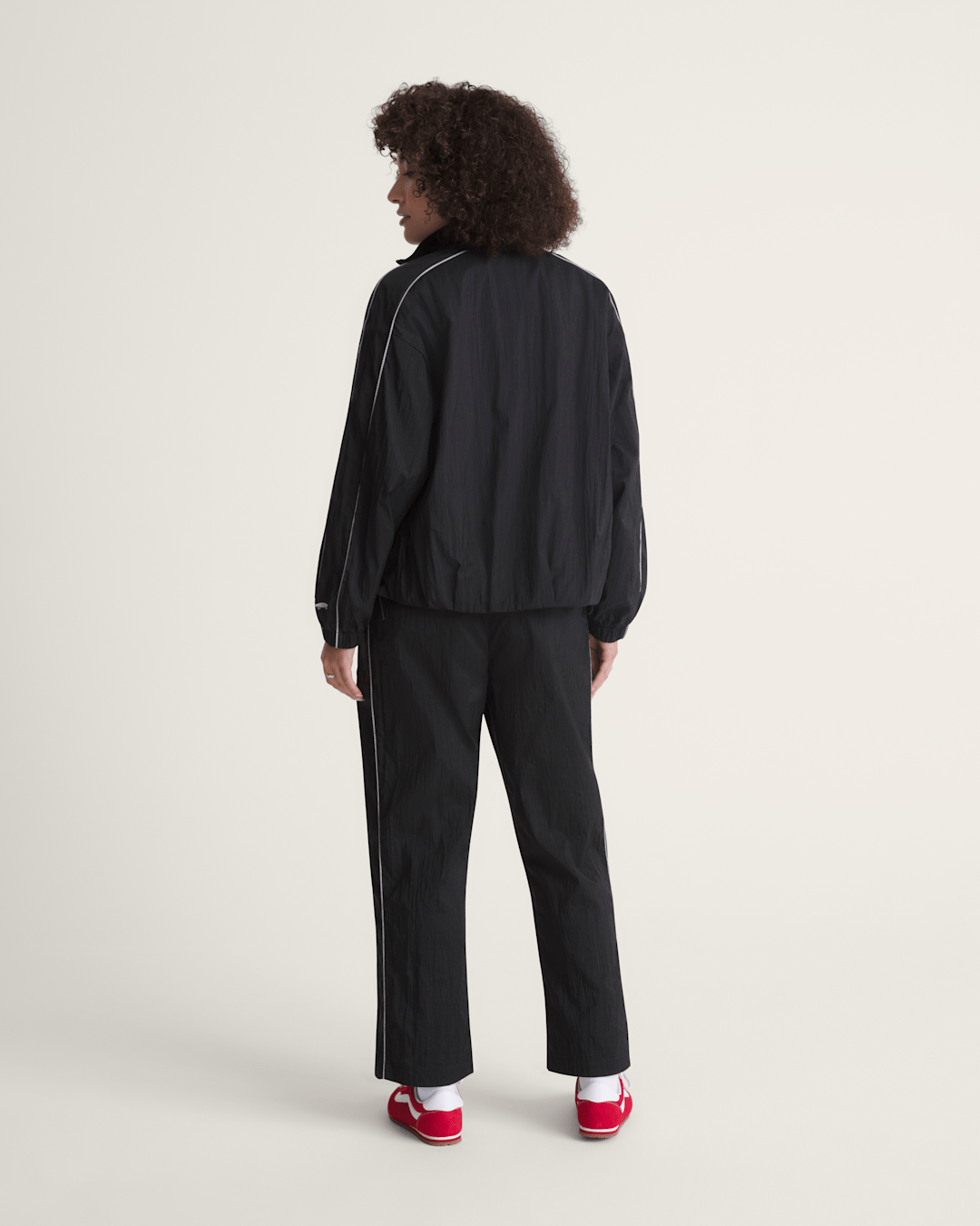 Women Vans Nyla Track Pant in Black