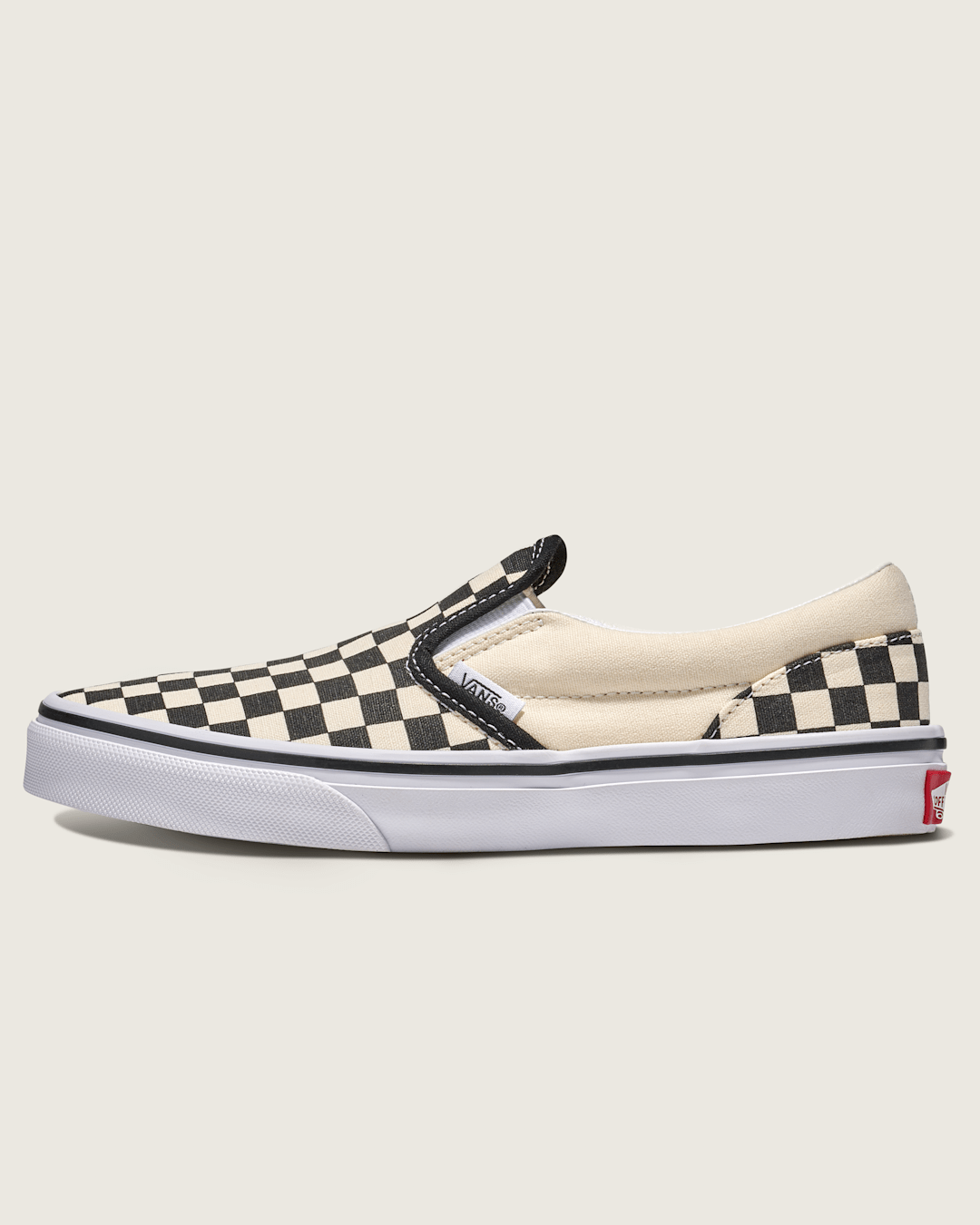 Kids Vans Big Kids Classic Slip-On Shoe in Checkerboard Black / White