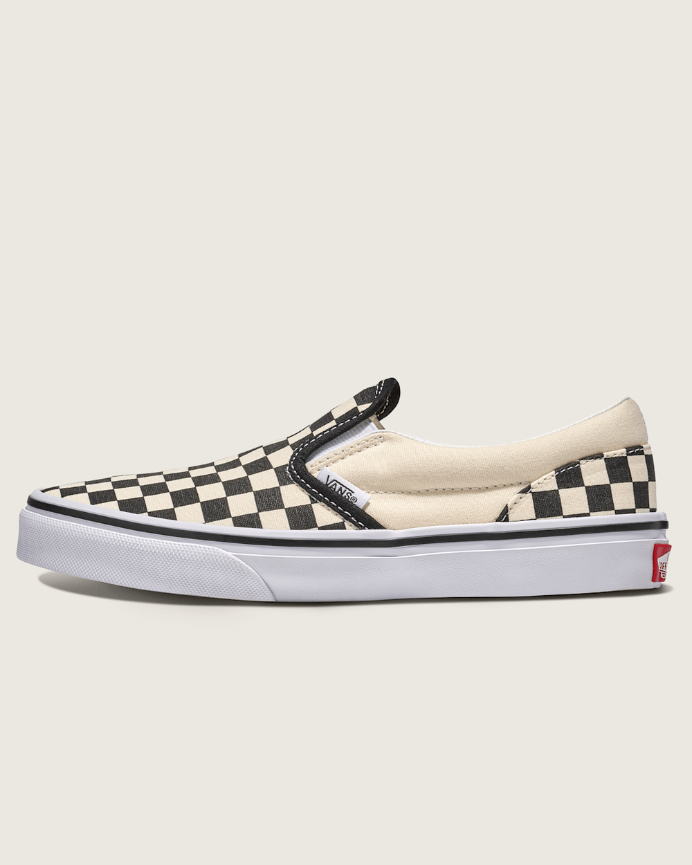 Kids Vans Big Kids Classic Slip-On Shoe in Checkerboard Black / White