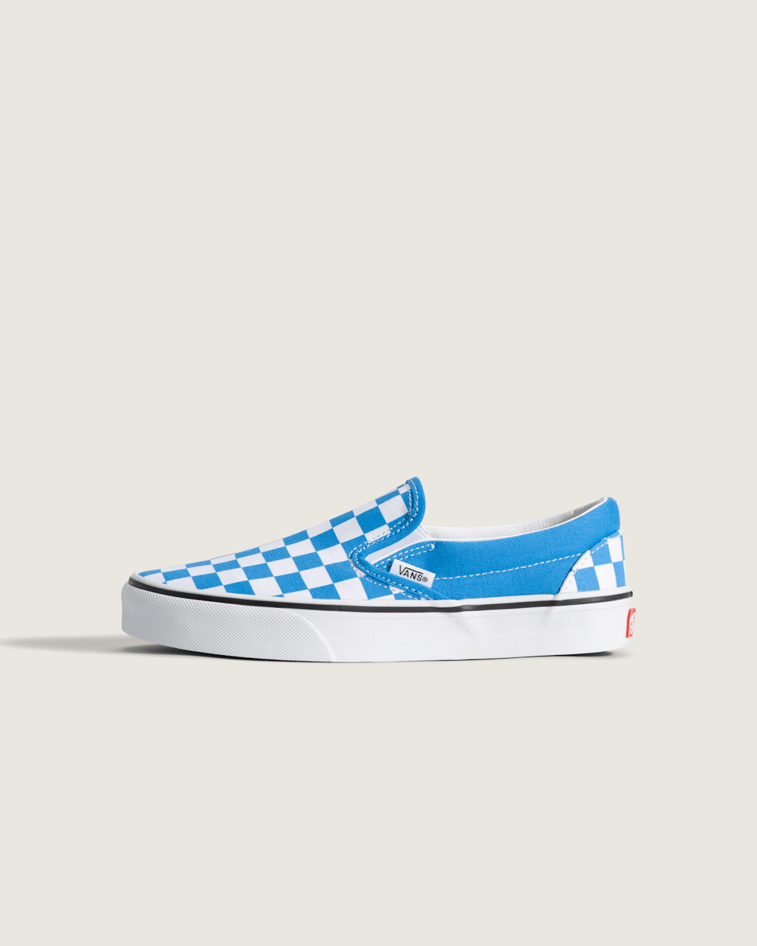 Kids Vans Big Kids Classic Slip-On Checkerboard Shoe in Checkerboard Bright Azure Blue