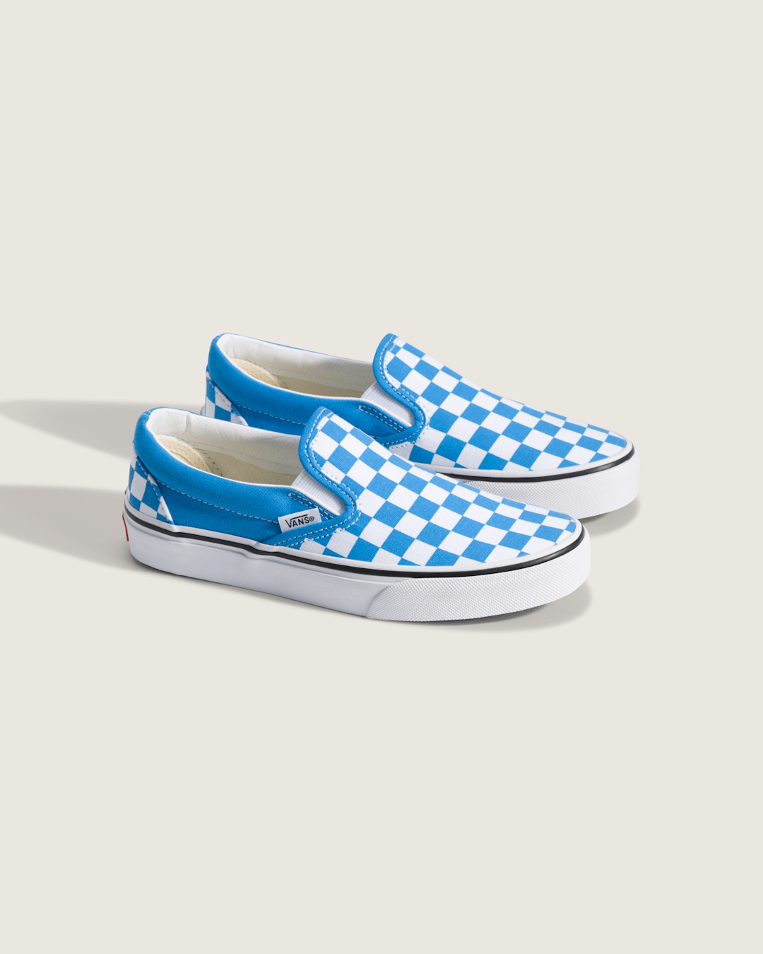Kids Vans Big Kids Classic Slip-On Checkerboard Shoe in Checkerboard Bright Azure Blue